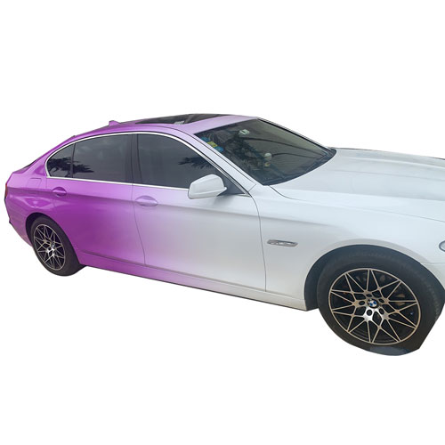 purple painting on the white car wrap