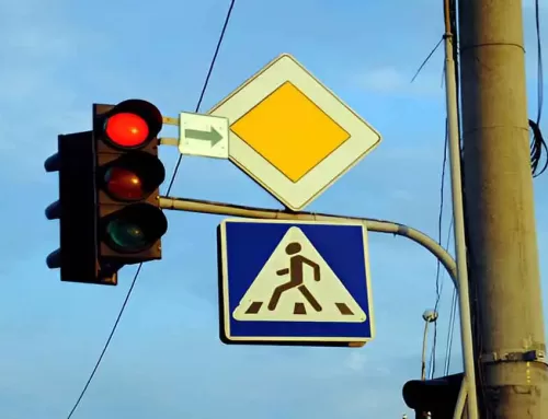 How do highway signs tell us information about the road?