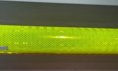 Yellow diamond grade prismatic reflective sheeting